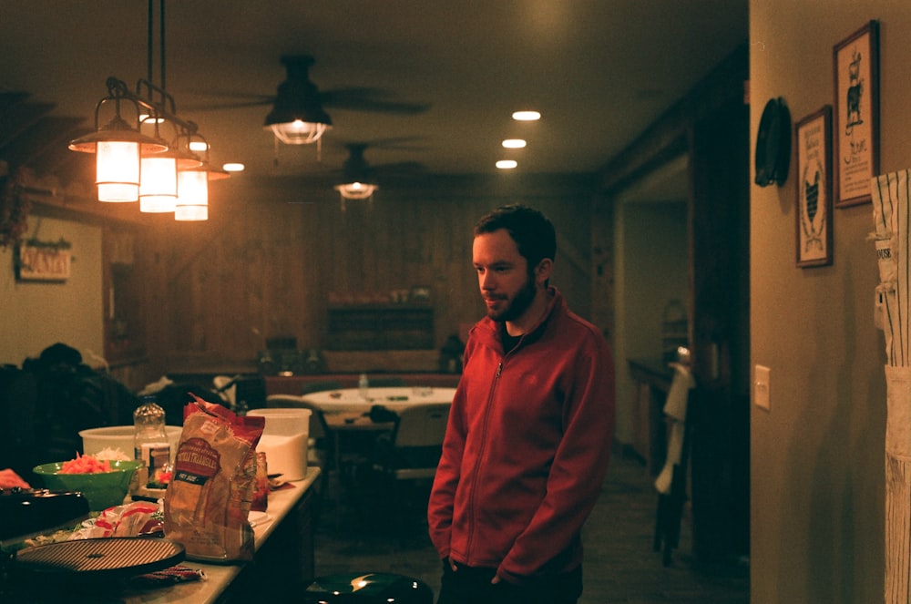 man in red jacket