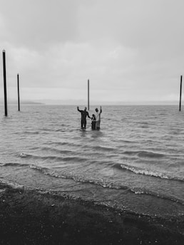three person on sea