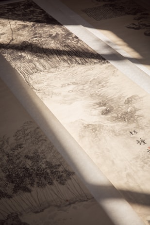 A serene traditional Chinese ink painting of mountains and flowing water symbolizing timeless wisdom.
