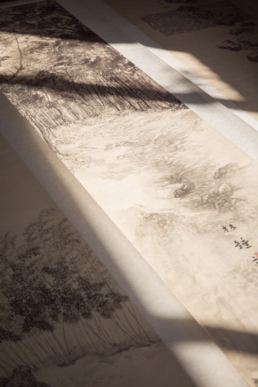 A serene riverside landscape painted in traditional Chinese brush style with gentle ink washes.