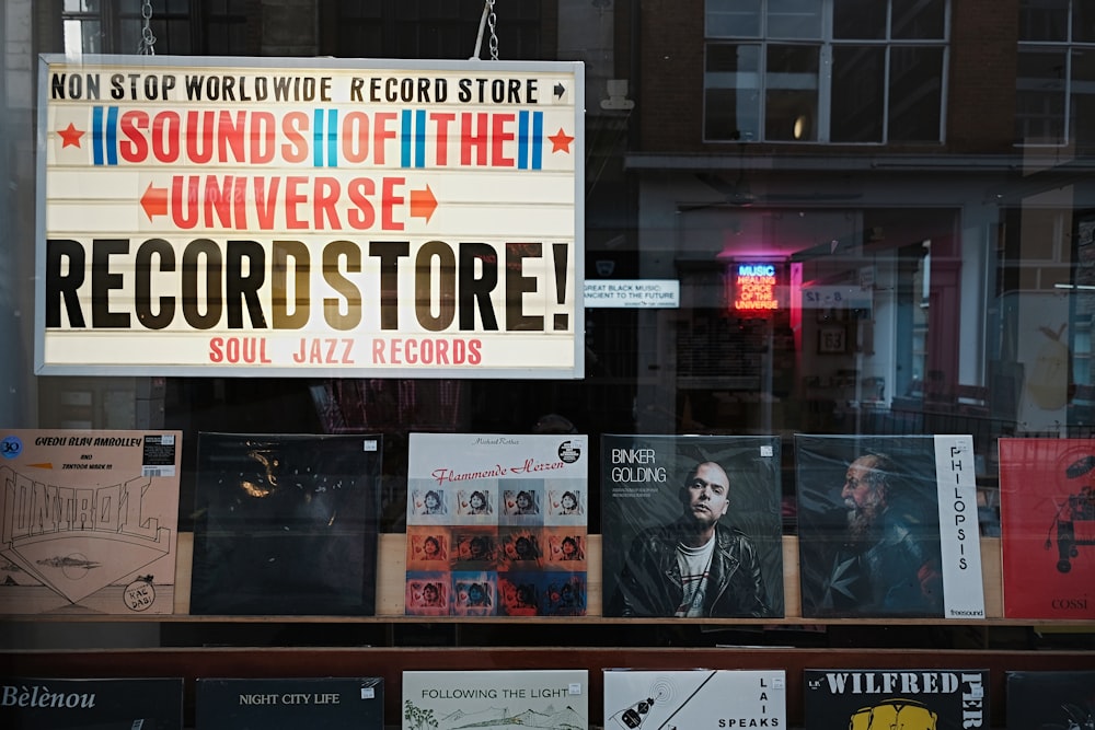 a record store with a sign in the window