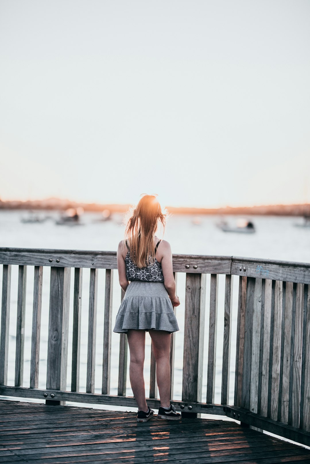 woman wears grey camisole