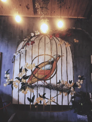 A cozy corner inside Saboresía with warm lighting and rustic decor reflecting Frida's artistic spirit.