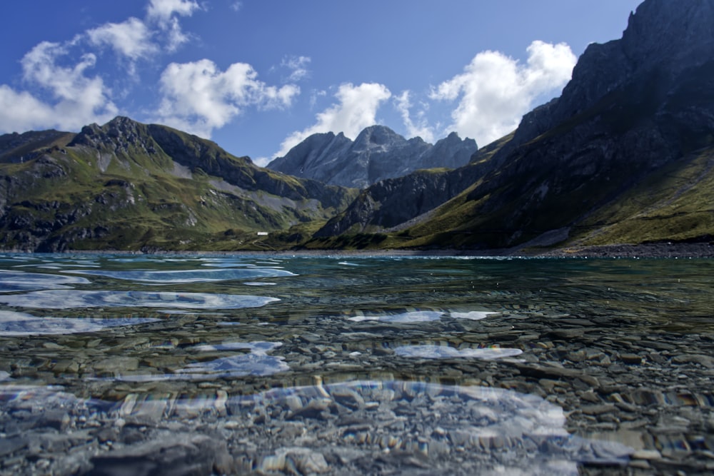 mountains under cloudy sky