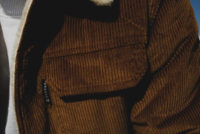 A close-up of the fabric texture of a sustainable jacket.