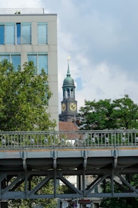 gray bridge near building