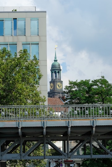 gray bridge near building