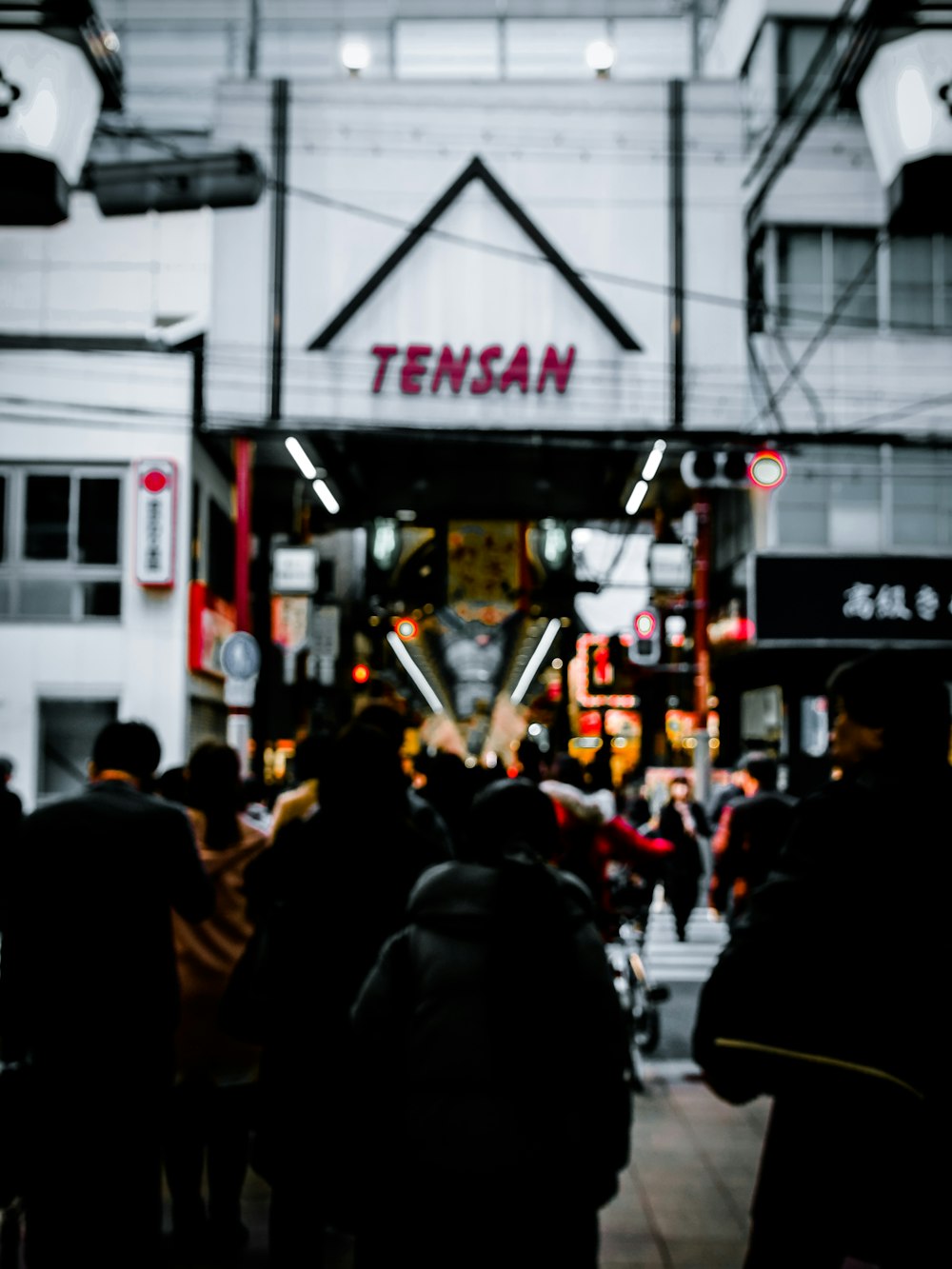 people crossing street during daytime