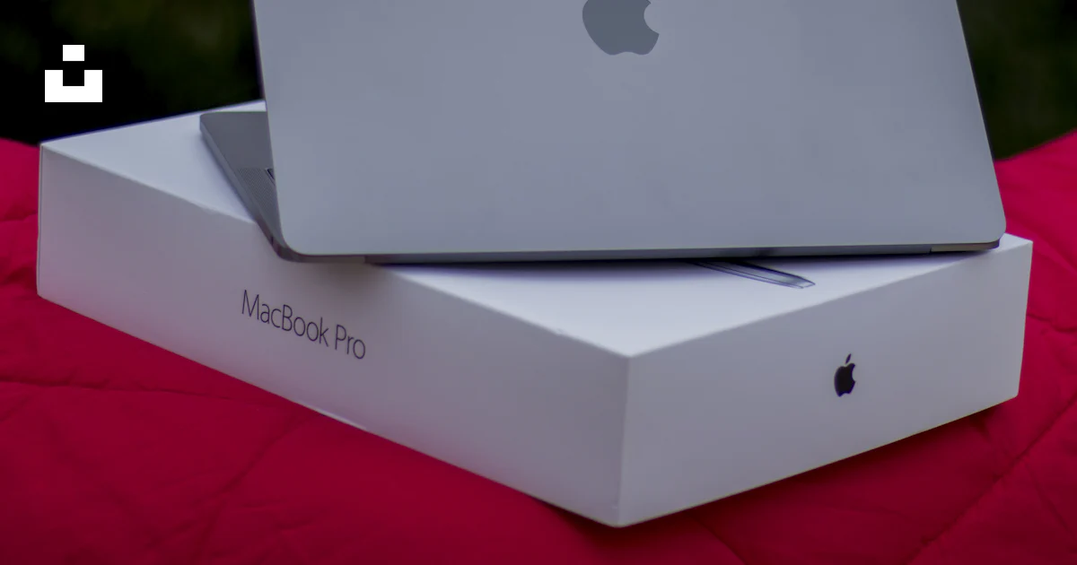 Macbook Pro on box photo – Free Grey Image on Unsplash