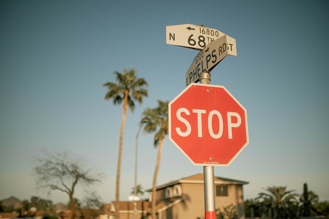 red and white stop signboard