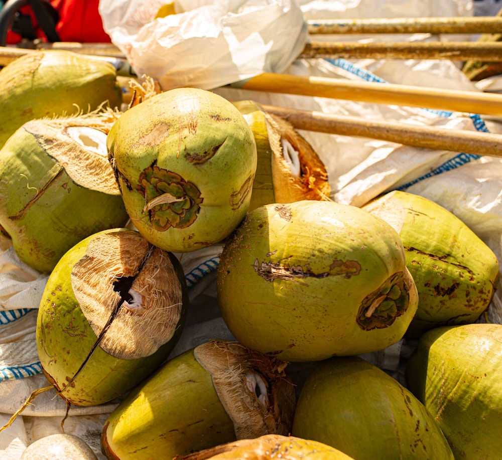a pile of coconuts sitting on top of a table