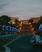 Bright LED bike lights illuminating a nighttime urban path