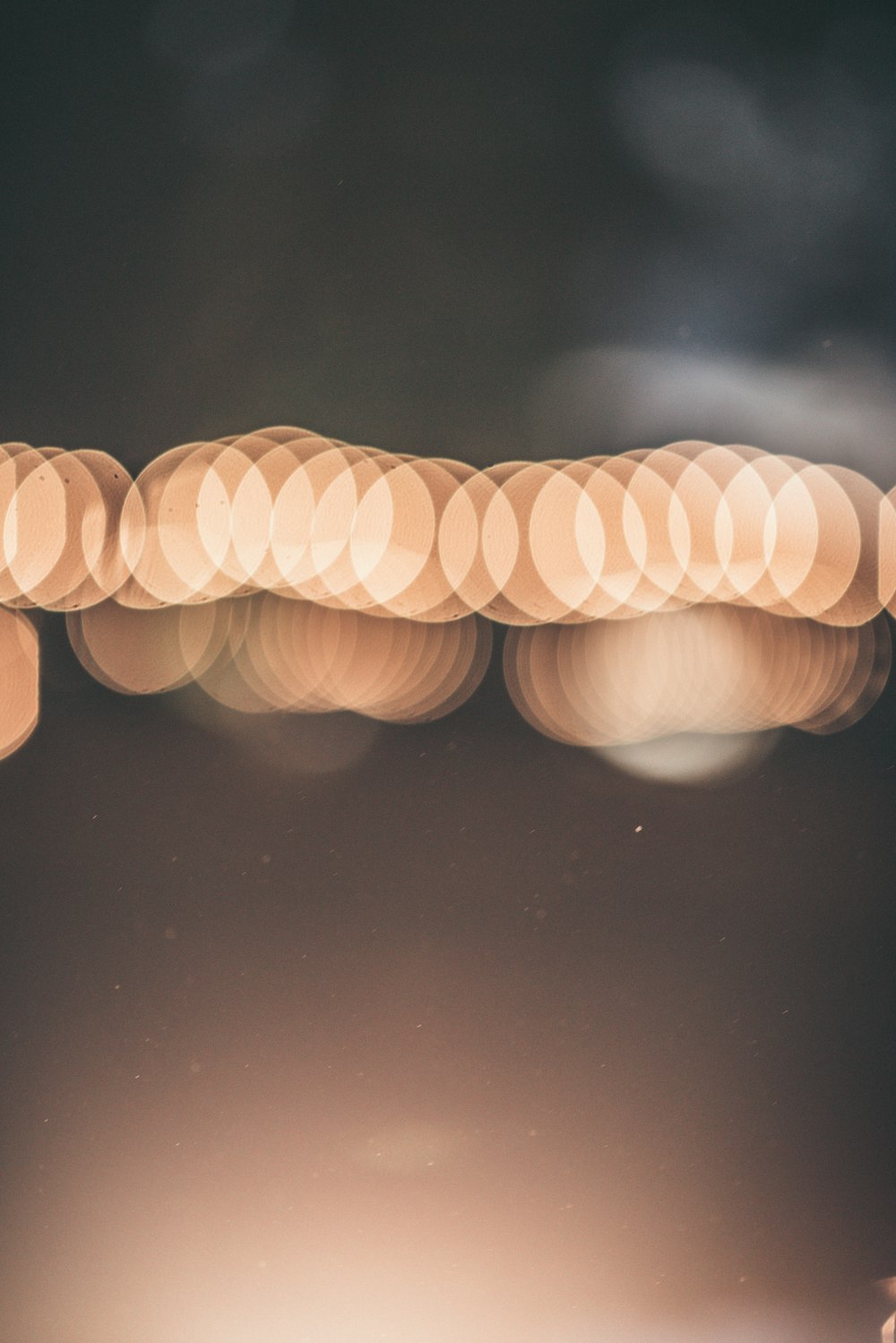 a blurry photo of a street light at night