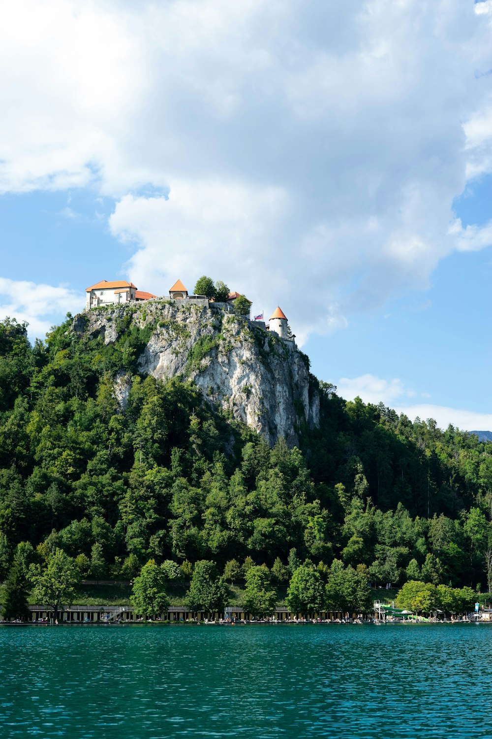 photography of buildings on top of mountain during daytime