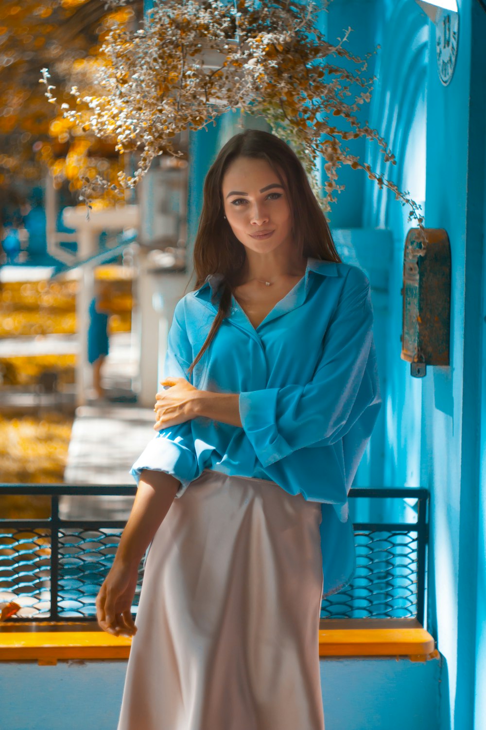 woman in blue dress shirt