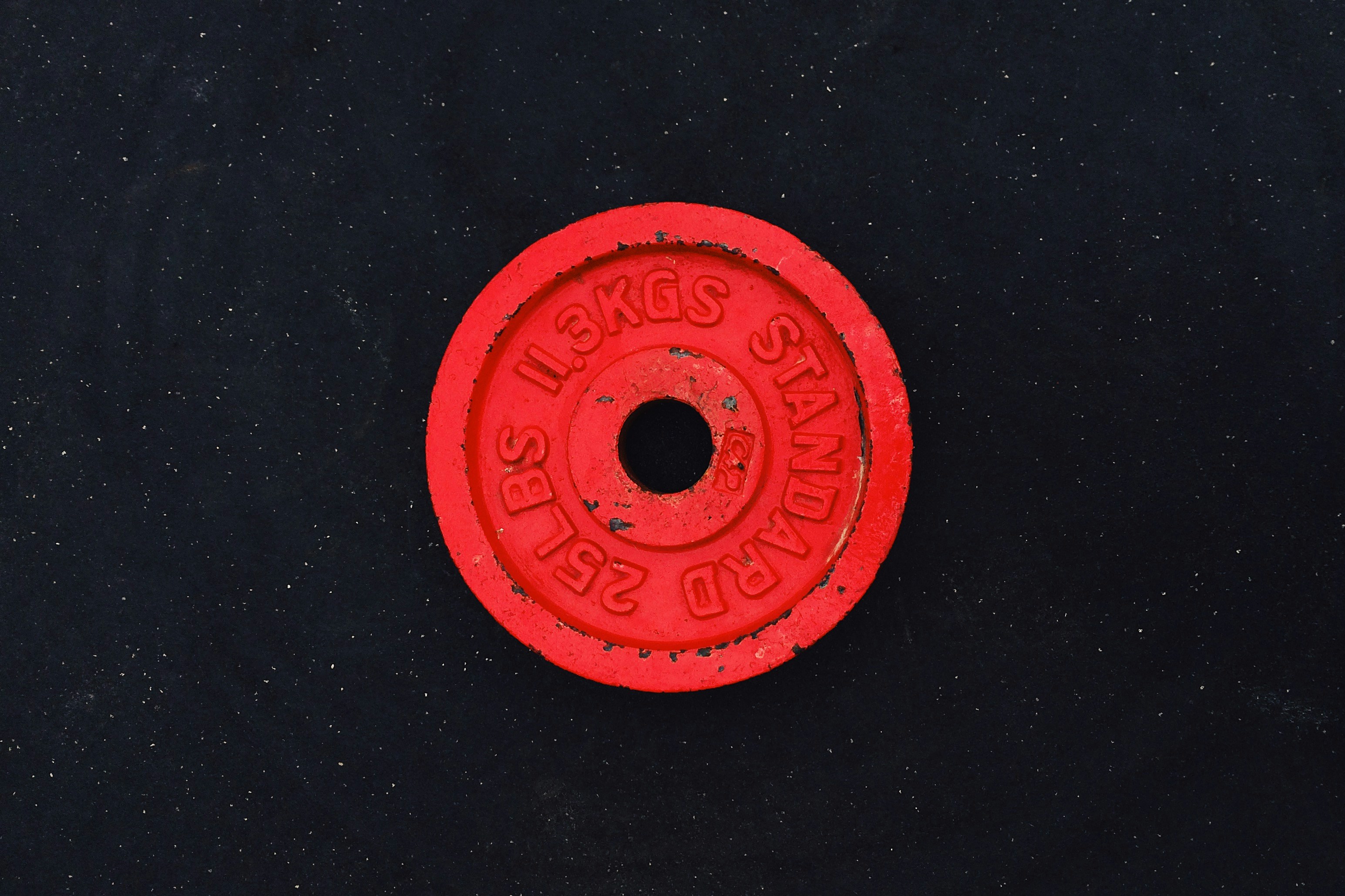 11.3 kgs red barbell plate