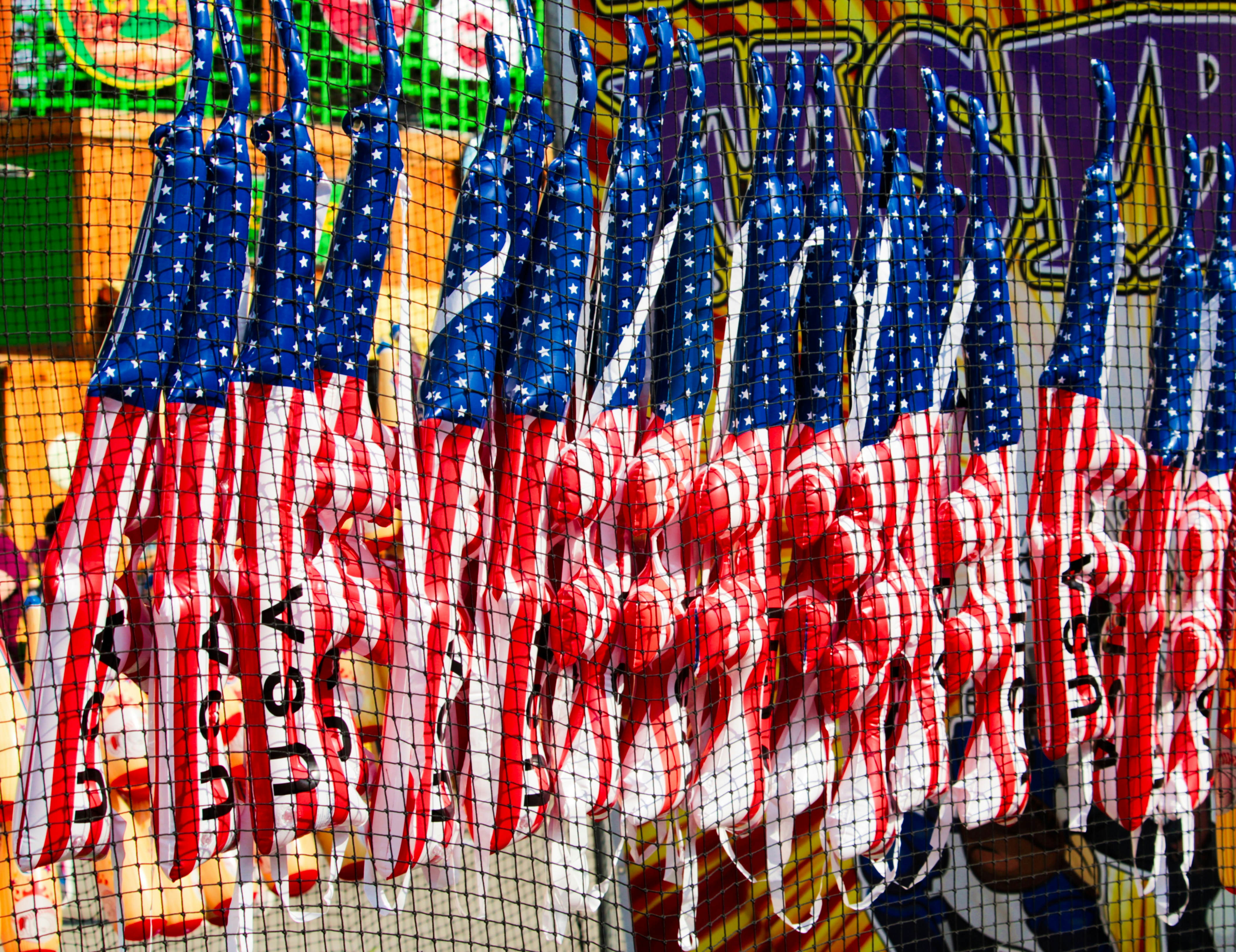 USA flag colors inflatable rifles.