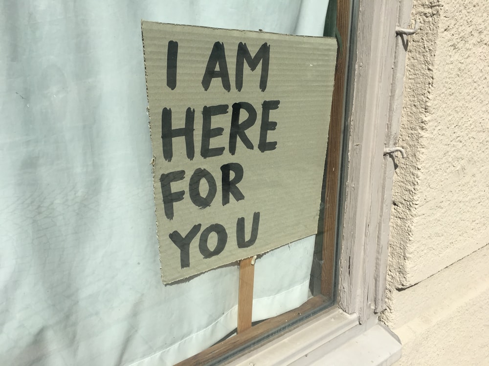 i am here for you signage