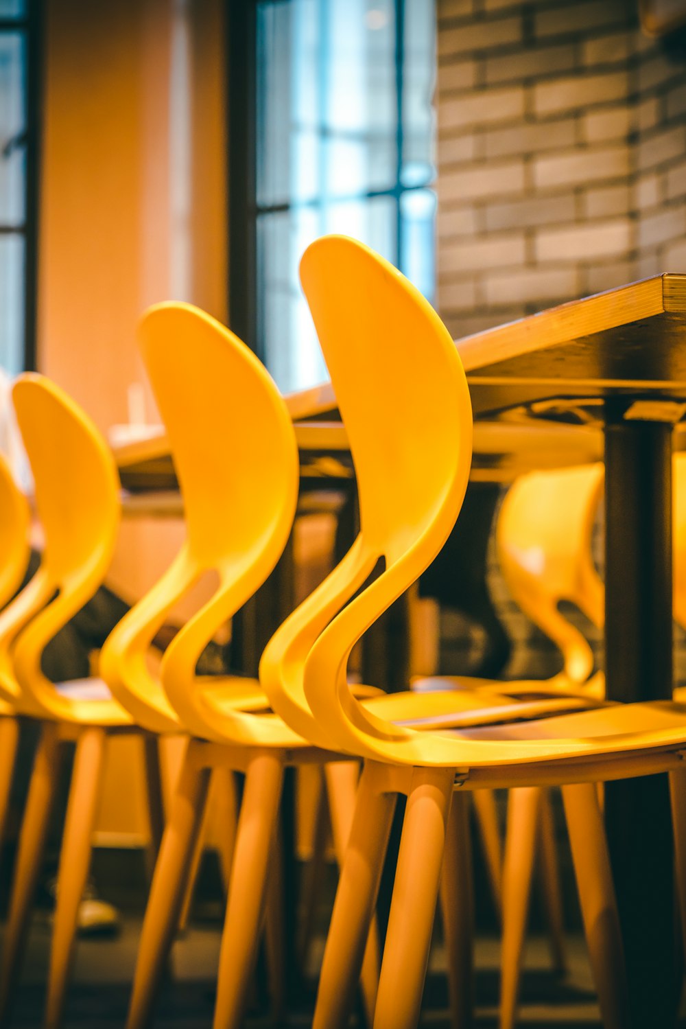 photo of three yellow chairs