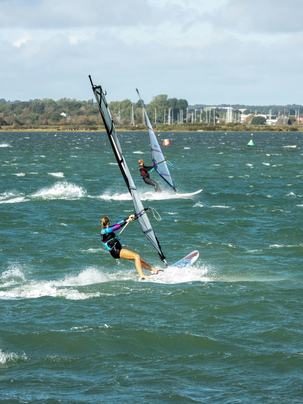 woman sailing surfboard