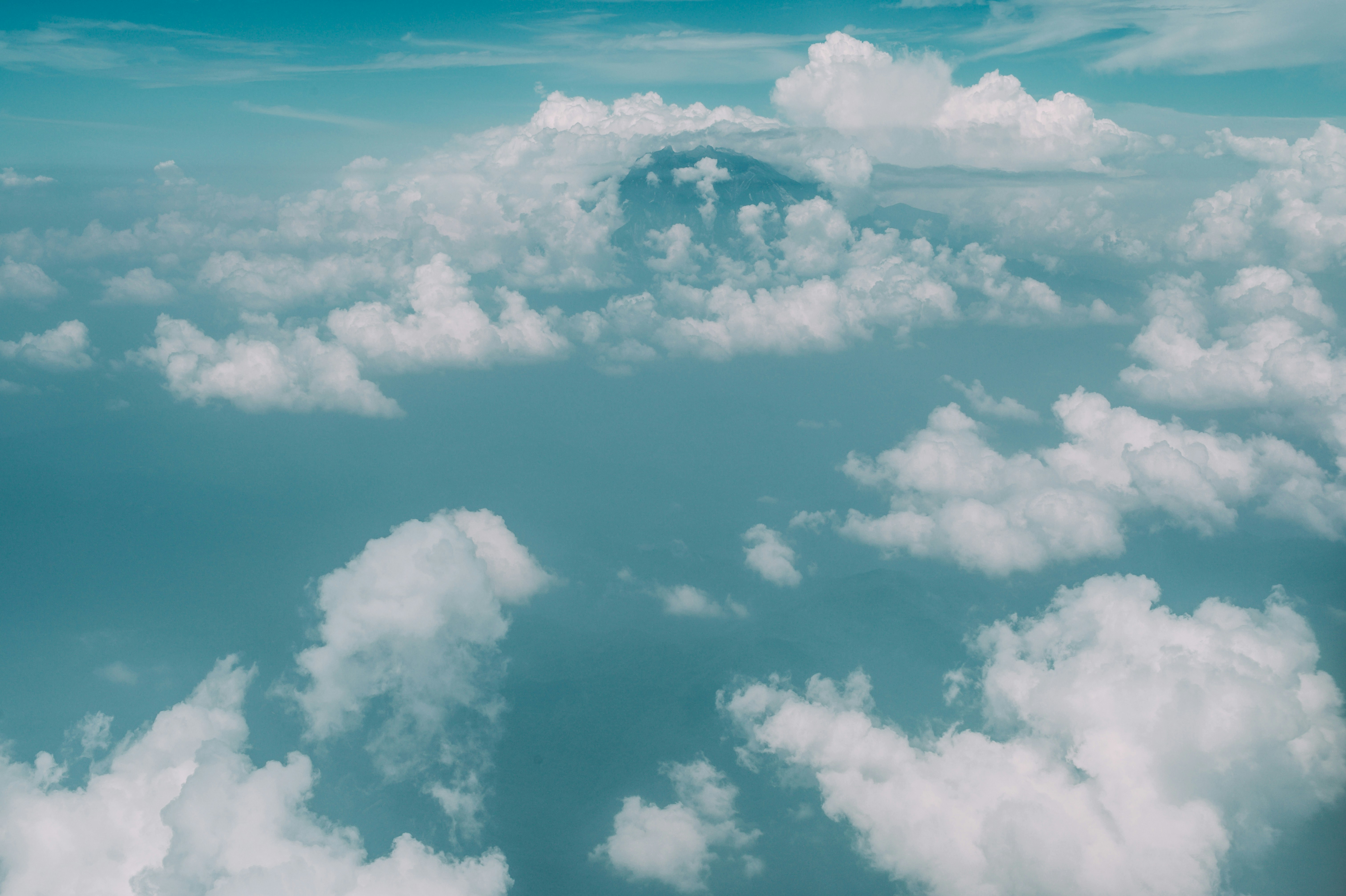 White clouds during daytime photo – Free Blue Image on Unsplash