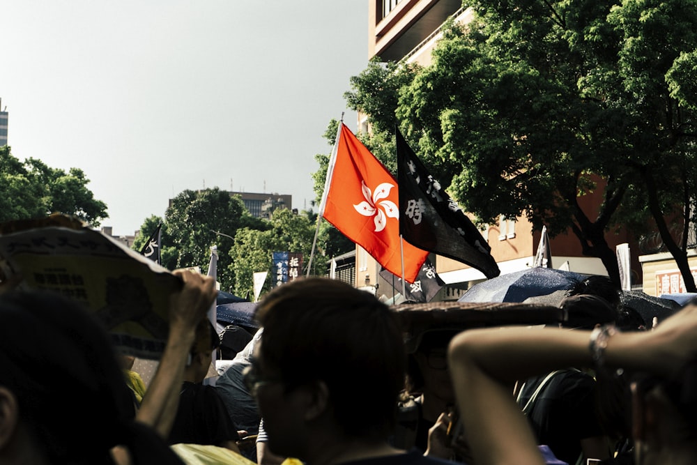 orange and white flag during daytime photo