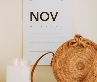 shallow focus photo of calendar mounted on white wall