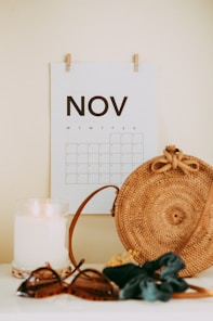 shallow focus photo of calendar mounted on white wall