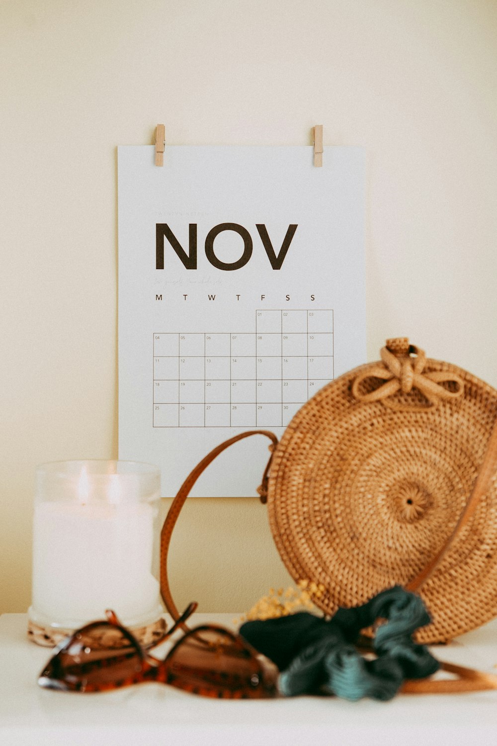 shallow focus photo of calendar mounted on white wall