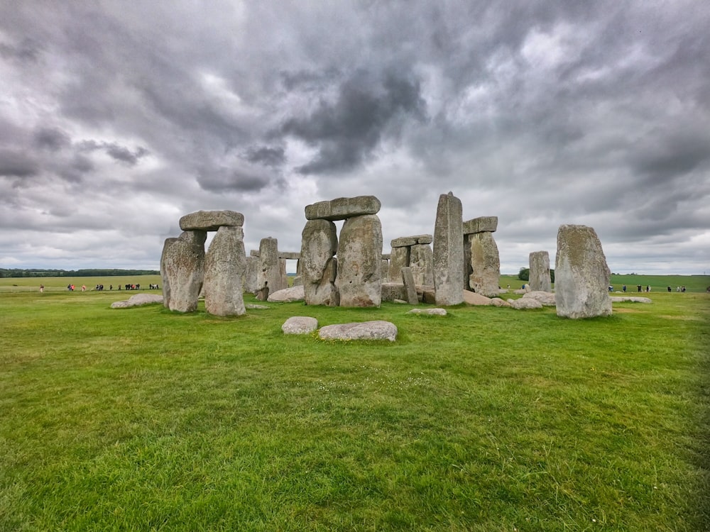 Stonehenge under cloudy sky during daytime
