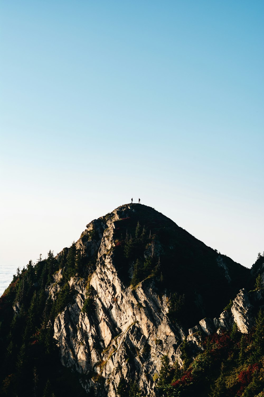 brown mountain under blue sky during daytime