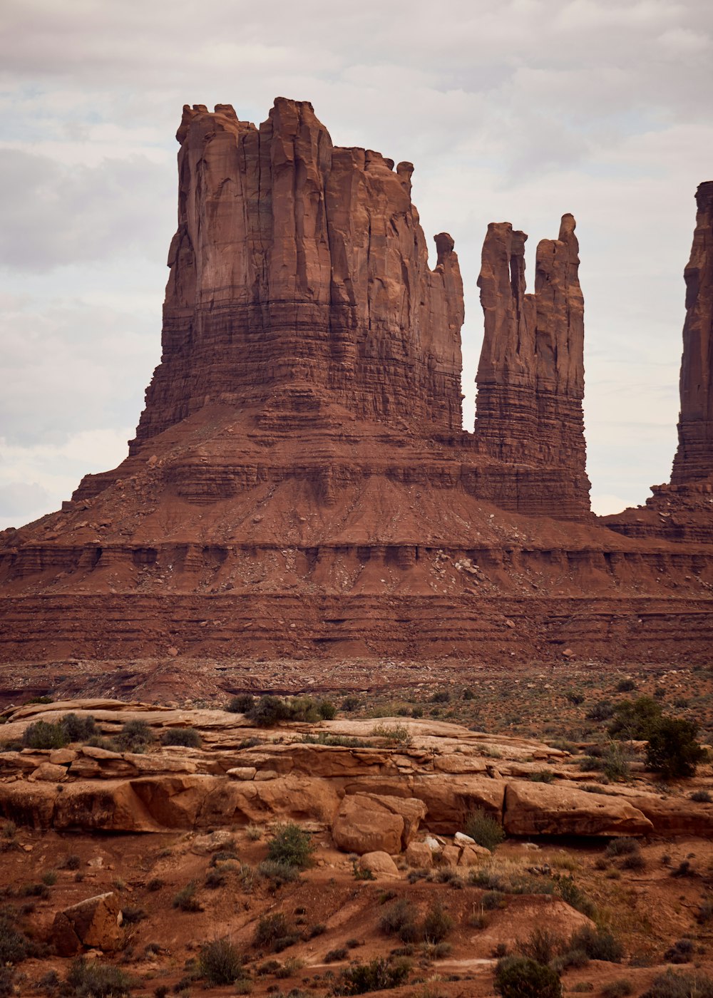 brown rock formations under white sky at daytime