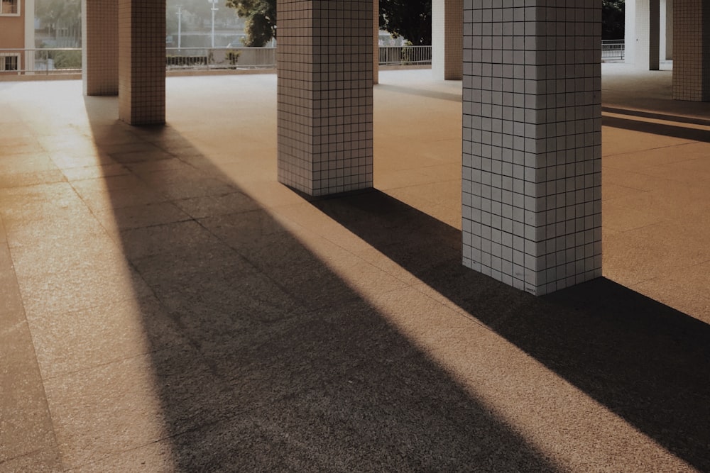 gray concrete posts at daytime