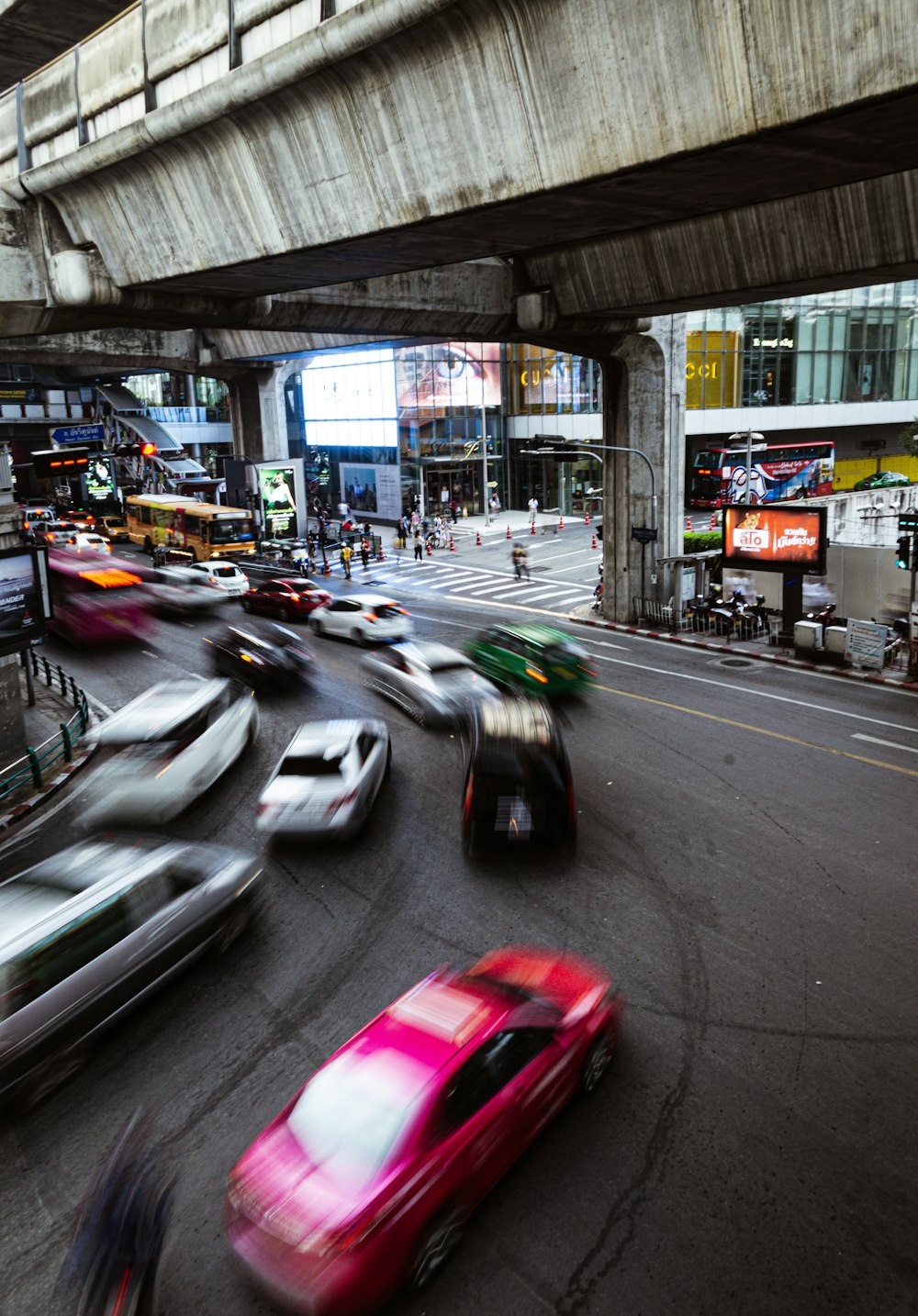 close-up photography of vehicle traveling on road