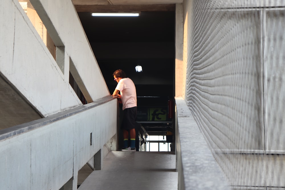 man standing on staircase