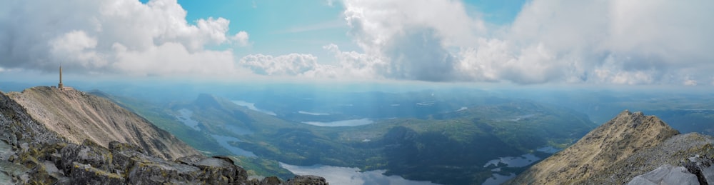 a person standing on top of a mountain