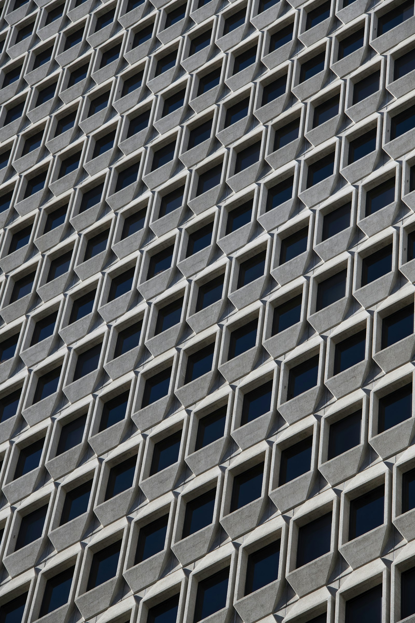 Nikon D850 + Nikon AF-S Nikkor 70-200mm F2.8G ED VR II sample photo. Gray concrete multi-storey building photography