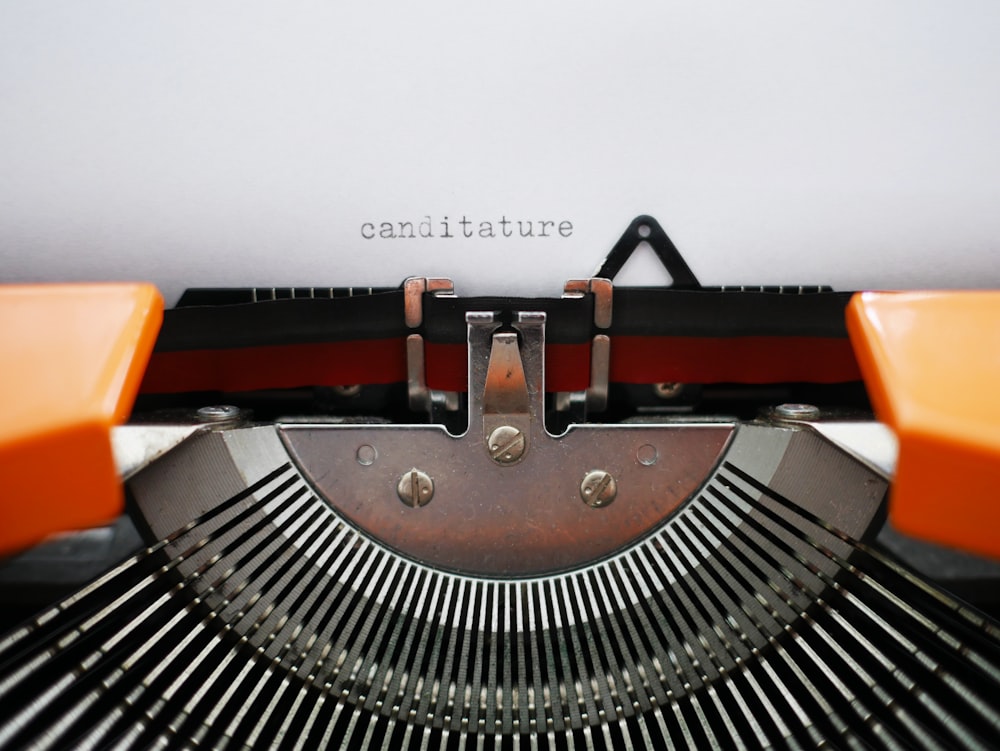 canditature text on typewriter machine