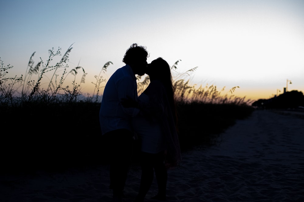 two persons kissing each other