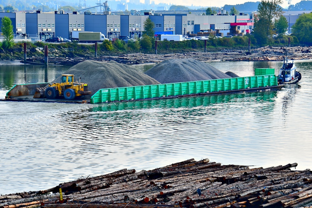 body of water with heavy equipments