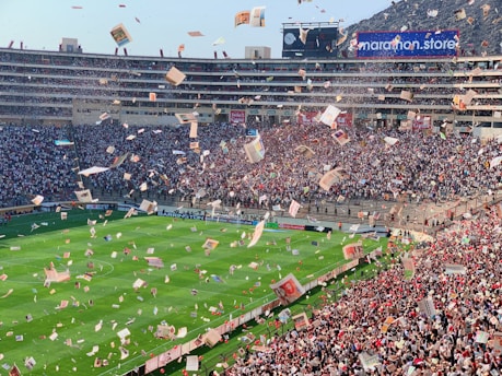 a large stadium filled with lots of people
