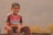 boy in red and black shirt