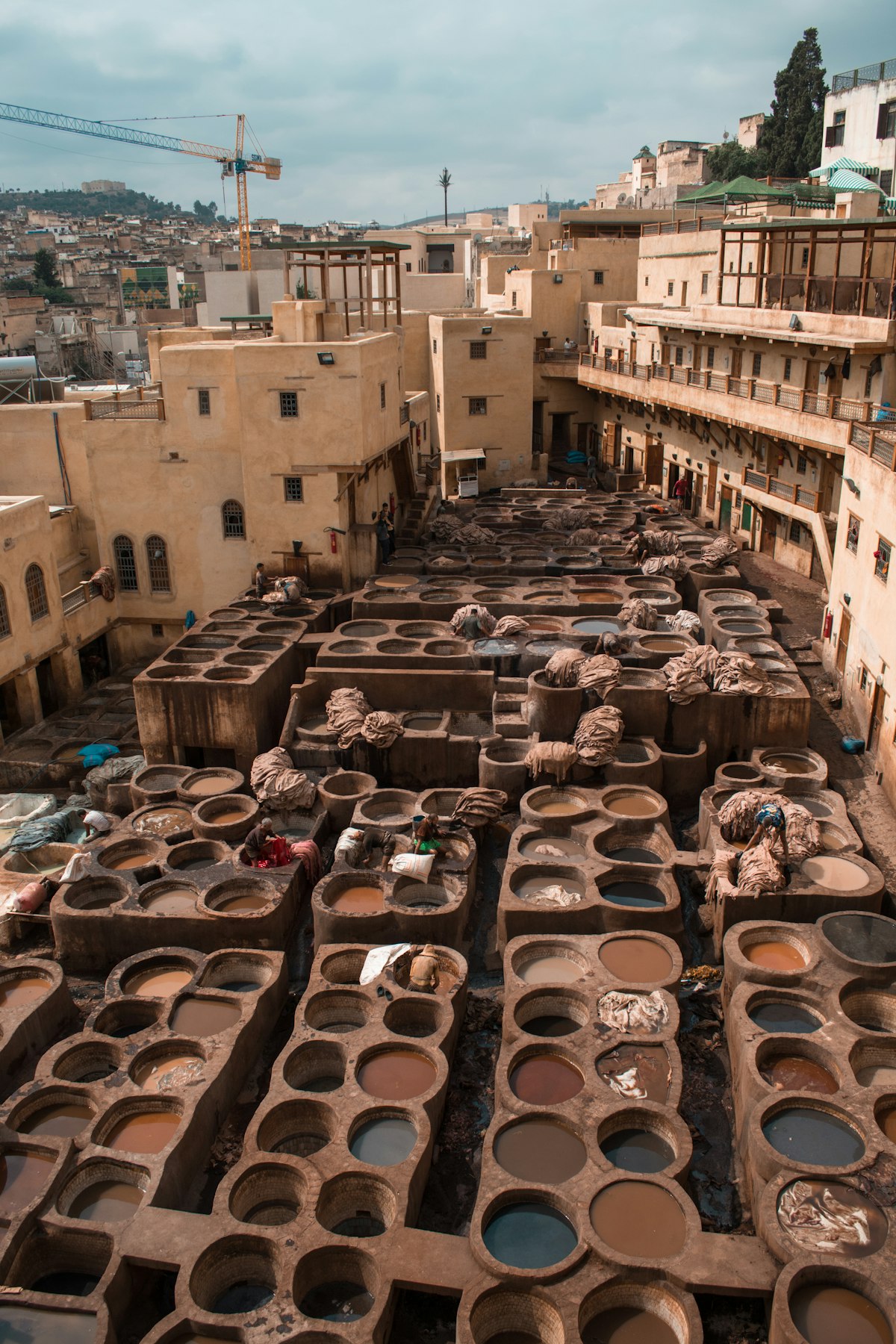Fez December — medina minaret and rooftops in winter morning mist