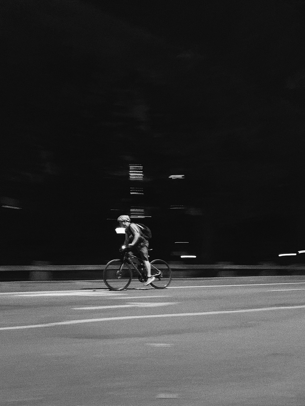 grayscale boy on bike photography