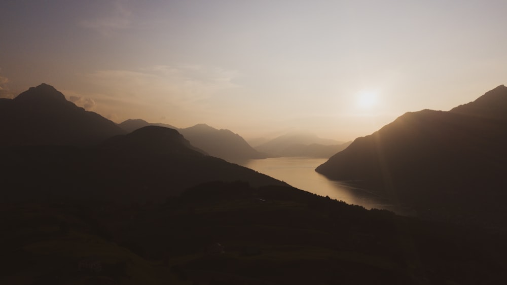 body of water and mountains