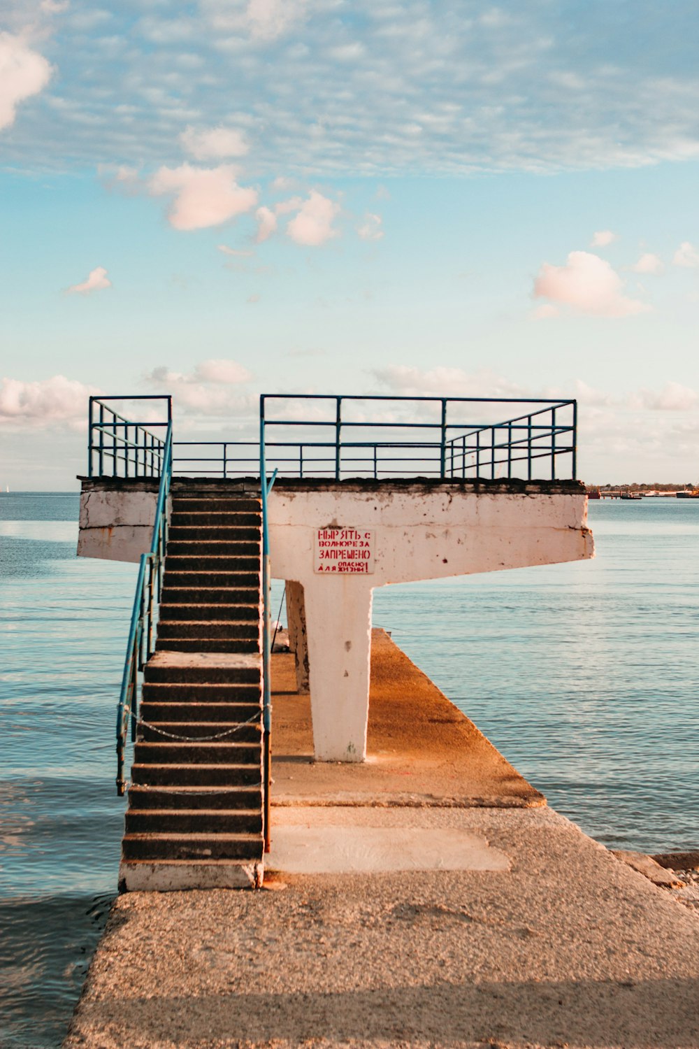 a set of stairs leading to the water