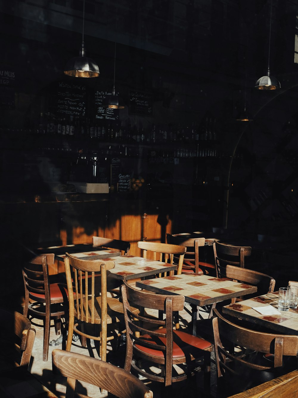 a dining room with a table and chairs