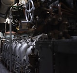A wide shot of a modern valve production facility with machinery and workers.