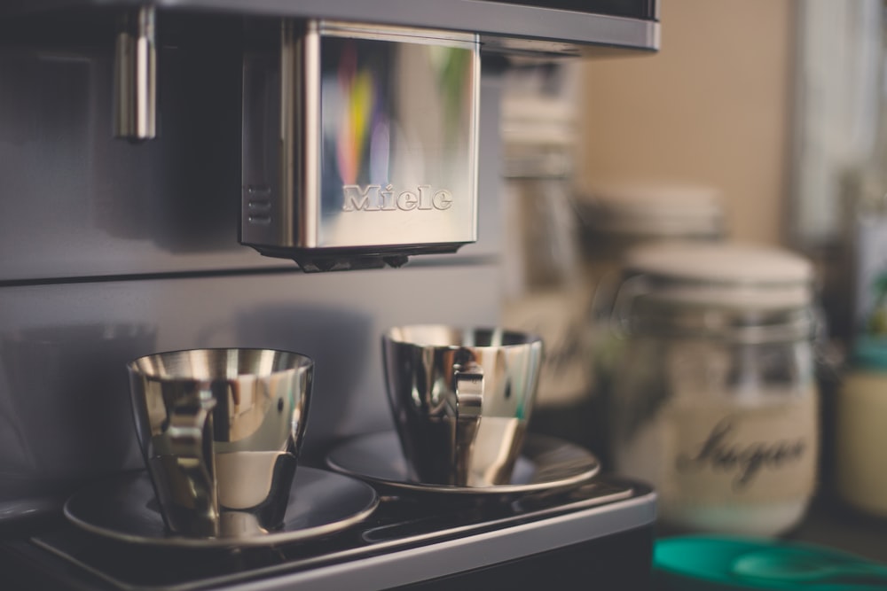 a close up of a coffee maker on a counter