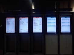 Dispatch team coordinating routes on multiple screens.